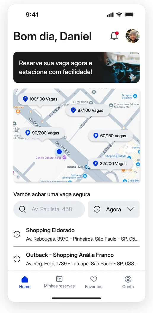 Home do StopCar: saudação, banner de reserva, mapa com a contagem de vagas livres em cada estacionamento e a busca com seletor de horário.